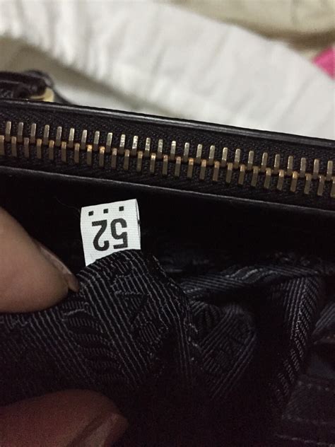 id tag borsa prada|prada purse serial number check.